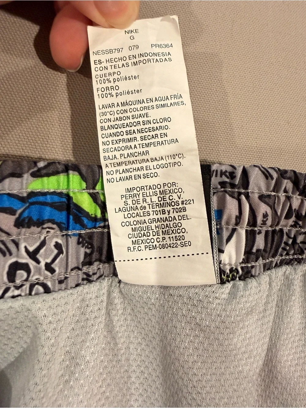 Nike Kids Gray Swim Trunks with Bright Graphic Print